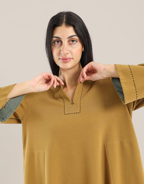 Milton long dress with round neckline with slits,